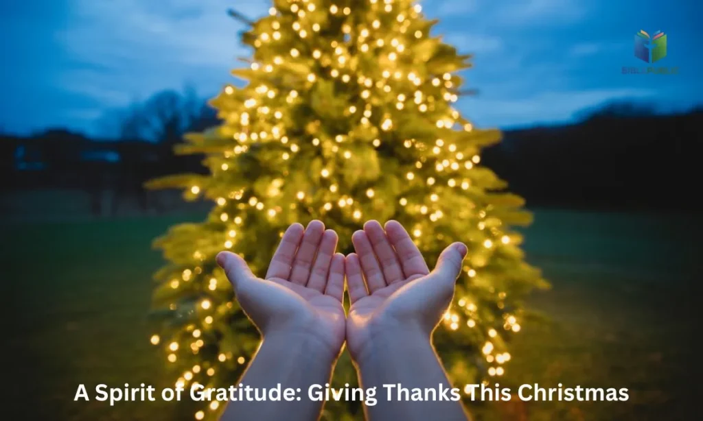 Hands lifted in gratitude in front of a sparkling Christmas tree.