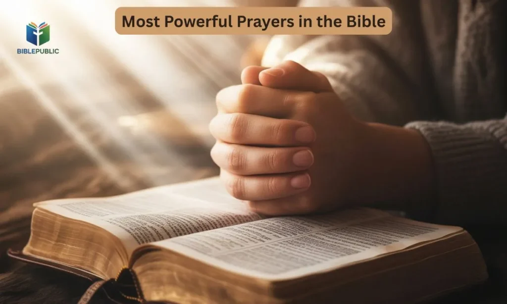 Hands folded in prayer over an open Bible, representing the most powerful prayers in the Bible for guidance, faith, and spiritual strength.